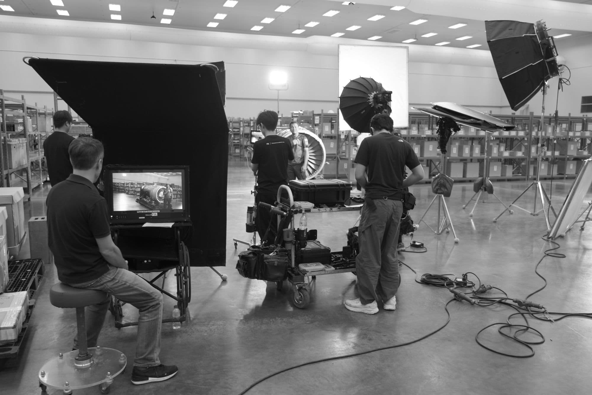 Behind the scenes: crew operating camera dolly